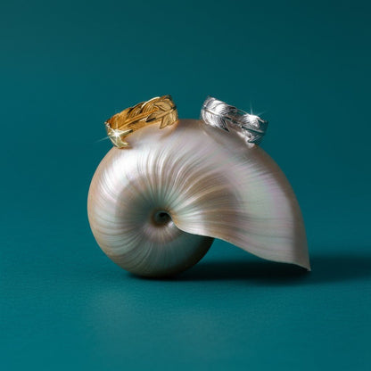 Verstelbare RVS Ring met Veertje Motief - (8 mm) - Aramat Jewels - Ringen - cadeautip