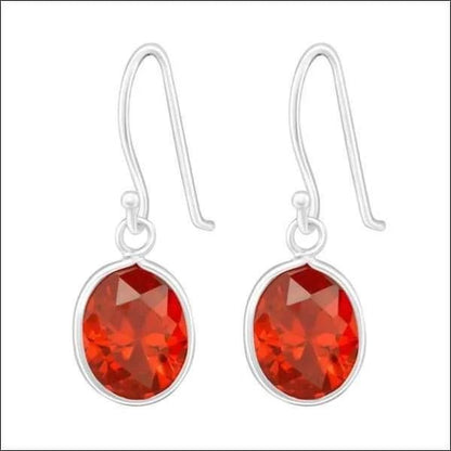 Sterling zilveren oorbellen met rood kristal