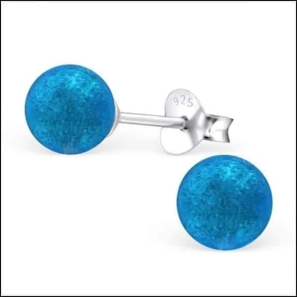 Blauwe glitter bal oorbellen
