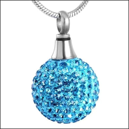 Stalen Ashanger Bol - Kleine Kristallen Blauw 8720157016533 alles Aramat Jewels ashangers Assieraad blauw bol chirurgisch staal dames gedenkhangers gedenksieraden Geen hanger kristal Met_steen Multikleur multikleurig PVD roze Staal transparant uniseks Volwassenen Zwart