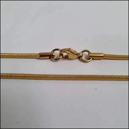 Stalen Slangenketting Goudkleurig 75cm 2mm 1.2mm 1.5mm 1mm 45cm 45cm / 1.5mm 45cm / 1mm 50cm 50cm / 1.2mm 50cm / 1.5mm 55cm 55cm / 1.5mm 60cm 60cm / 1.5mm 65cm 65cm / 1.5mm 70cm 70cm / 1.5mm 75cm 75cm / 1.5mm 75cm / 2mm 80cm 80cm / 1.5mm 8720157042570 alles Aramat Jewels chirurgisch staal dames Geen edelsteen Geen hanger Geen_Parel Geen_steen goudkleurig halskettingen ket776 Ketting zonder hanger Meerdere Maten PVD schakelketting slangen Staal tekst uniseks unisex Volwassenen Zonder_hanger Zonder_steen